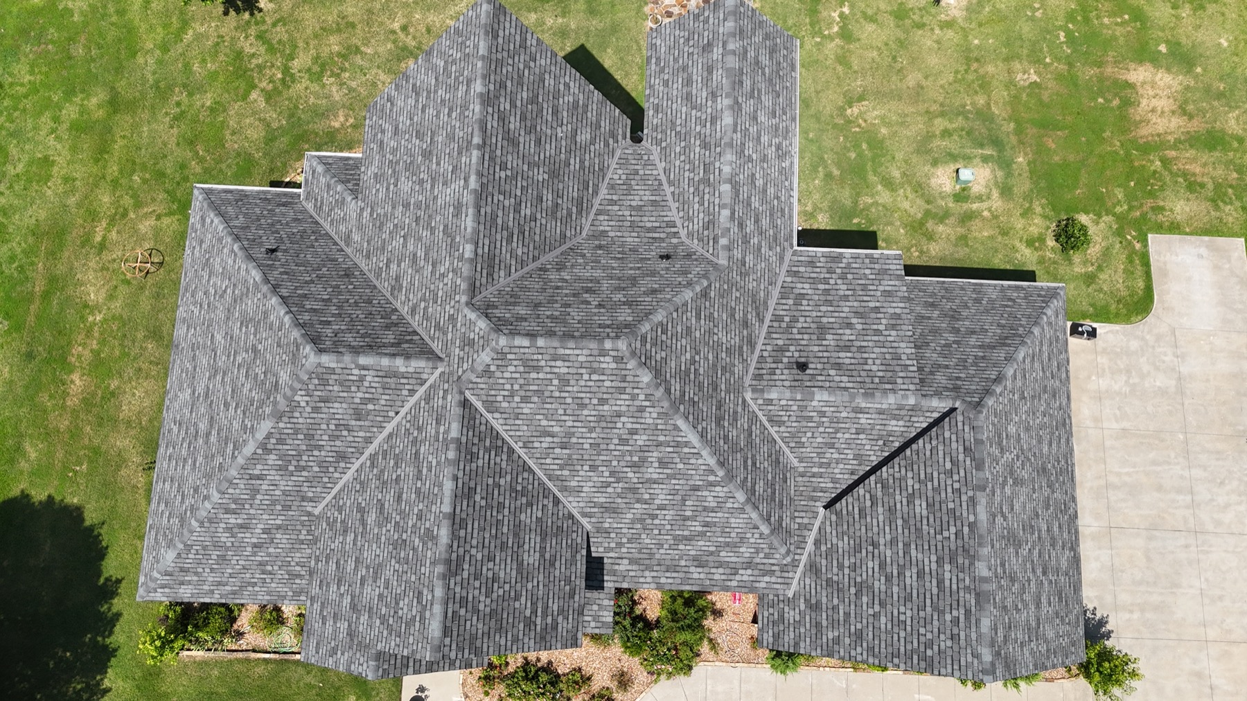 Aerial detail of a finished SMI Roofing shingle roof